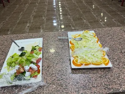 two plates of food on top of a counter at Shakria Bedouin Life Camp in Wadi Rum