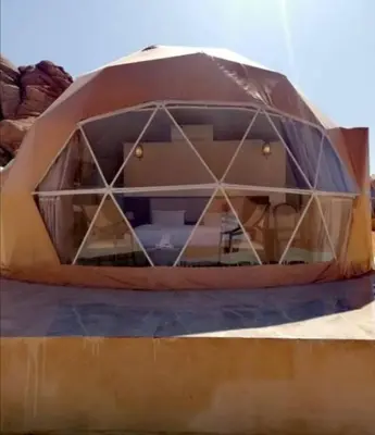 a dome tent sitting on top of a table at Lukasa camp Wadi Rum in Wadi Rum