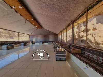 a large room with a cow on the wall at White Desert Camp in Wadi Rum