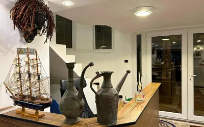 a group of vases sitting on a table at Celestia Boutique Inn in Jerash