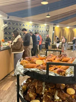 a bunch of pastries on a tray in a restaurant at Sunrise Luxury Camp in Wadi Rum