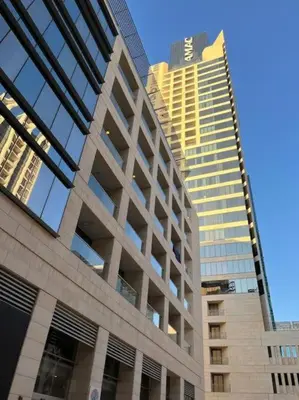 a building with two tall buildings in a city at Luxury Studio DAMAC TOWER - 1 BEDROOM -JORDAN in Amman