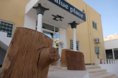 a wooden fence in front of a building at VALUE PLACE in Wadi Musa