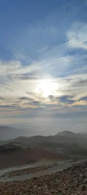 a view of a desert with a river in the sky at private room with cultural experience and great landscapes in Şirfah