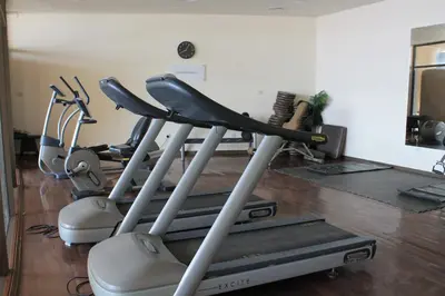 a group of exercise bikes in a gym at Samarah Dead Sea Resort Studio-CP6 Traveler Award 2026 Winner Thursday, Friday and Saturday Groups consisting solely of male guests are not permitted in Sowayma