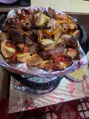 a plate of food on top of a table at stars magic camp in Wadi Rum