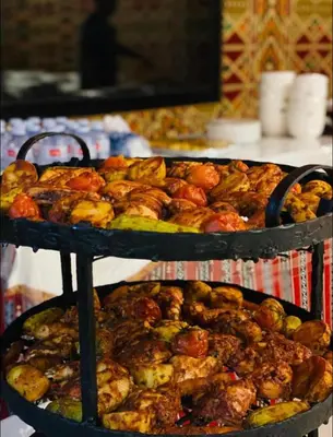 a bunch of food on top of a tray at Wadi Rum Desert Stars in Wadi Rum