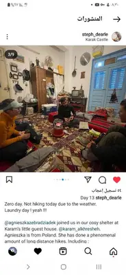 two people sitting in a living room at Beit alkaram in Kerak
