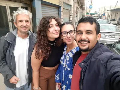 a group of three people posing for a picture at Beit alkaram in Kerak
