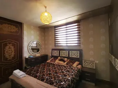 a bedroom with a bed and a window in it at Top 