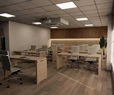 an office with desks and chairs in a room at Bratus Hotel in Aqaba