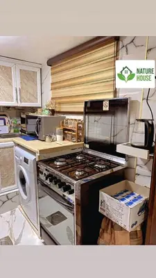 a kitchen with an oven and a stove top at بيت الطبيعة nature house in Jerash