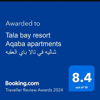 a screenshot of a cell phone with the text awarded to tala bay resort ap at one bedroom apartments aqaba on for family only 2 swimming pool Tala bay for family only in Aqaba