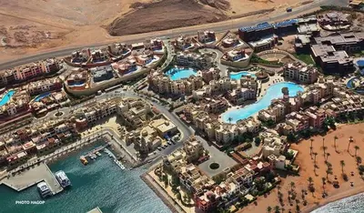 an aerial view of a resort near the water at one bedroom apartments aqaba on for family only 2 swimming pool Tala bay for family only in Aqaba