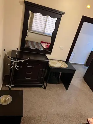 a dressing table with a large mirror in a room at Petra luxurious view house in Wadi Musa