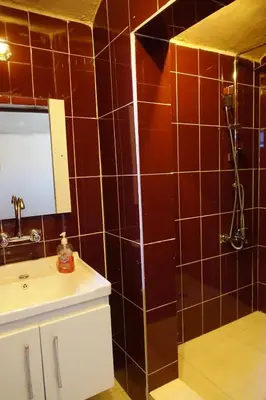 a bathroom with a sink and a mirror at Dana Nabil Ecu Camp House - Main Gate Dana nature reserve in Dana