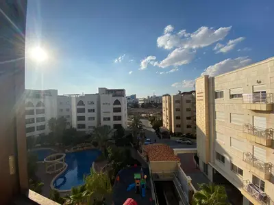 a view from the balcony of a building at Ritala Royal Residence in Amman