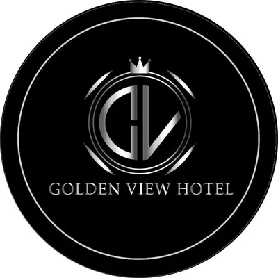 a black emblem with a golden view hotel with a crown at Golden View in Aqaba