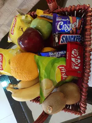a basket filled with different types of food at Dream Home in Amman