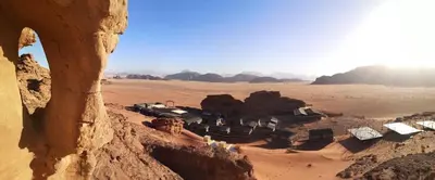 a view of a village in the desert at wadi rum Golden Sand in Wadi Rum