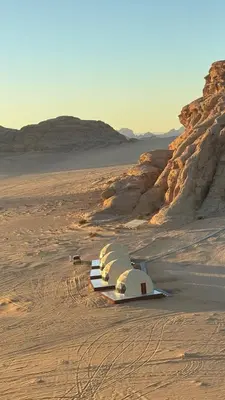 a tent in the middle of a desert at Wadi rum sky luxury in Wadi Rum