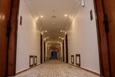 a hallway of a building with a long corridor at The RN Hotels in Wadi Musa