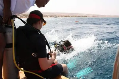 a person being pulled by a boat in the water at The Royal Luxury Tiger Patio in Amman