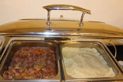 a toaster oven with a tray of food in it at Dweik Rooftop in Aqaba