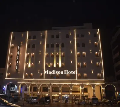 a night view of a marriott hotel at Madison Hotel in Amman