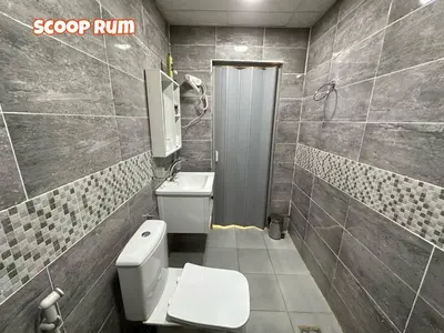 a bathroom with a toilet and a sink at Scoop Rum in Wadi Rum
