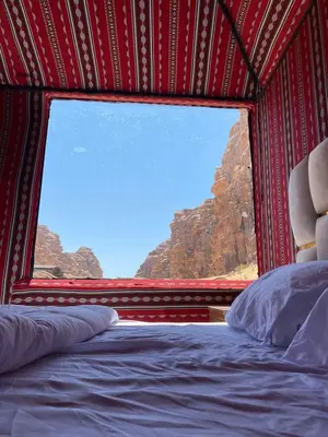 a red tent with a view of a mountain at Red Twilight Camp in Disah