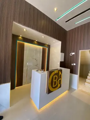 a building with a bfg sign in a room at Castle beach hotel in Aqaba