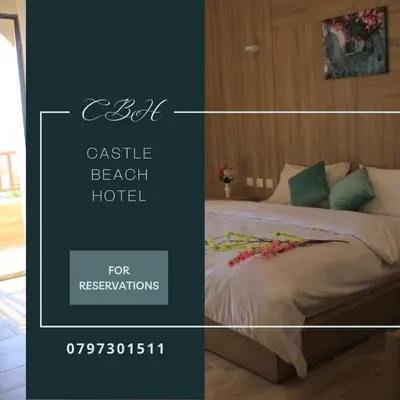 a picture of a bed in a hotel room at Castle beach hotel in Aqaba