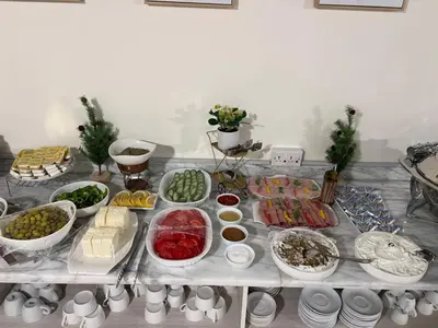 a table topped with lots of different types of food at Sky Hotel in Aqaba